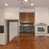 White bead board and stained maple cabinets with maple top